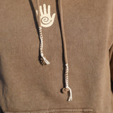 Brown hoodie with a hand design on the drawstring